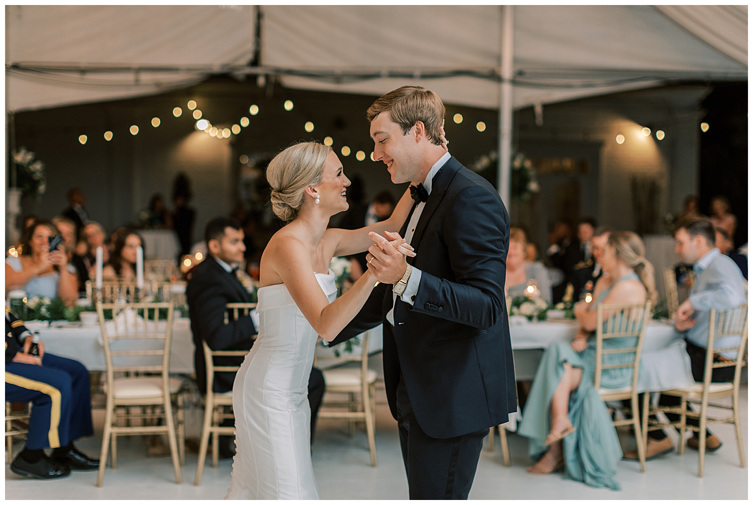 A couple shares their first dance as husband and wife.
