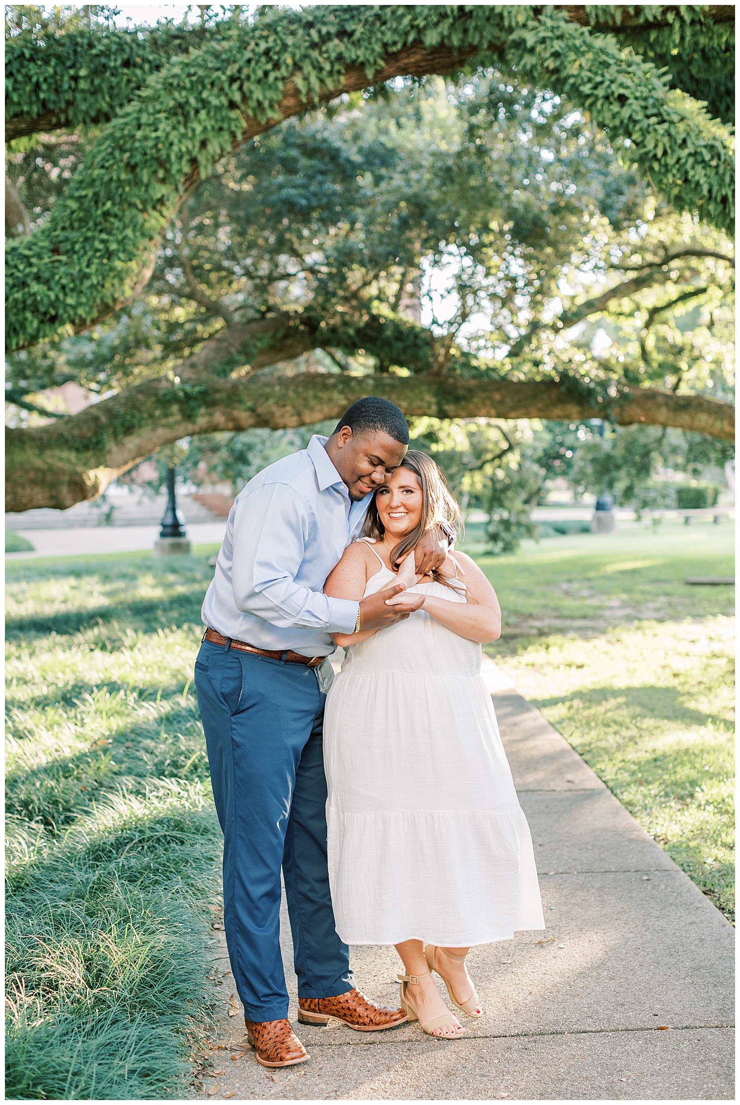 A joyful couple embraces each other at Southern Mississippi University.