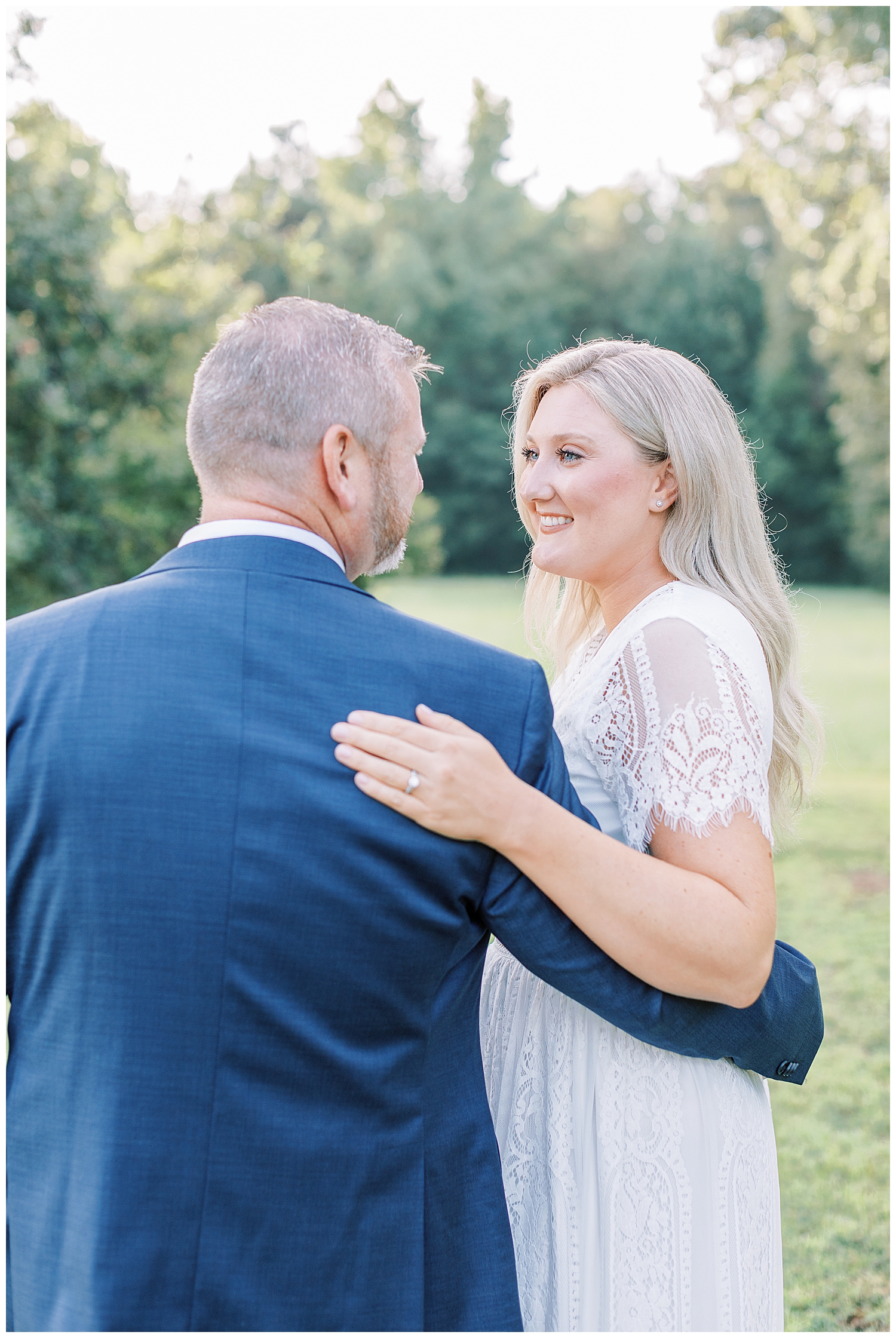 Juliann Riggs Photography captures engagement photos of a joyful couple.