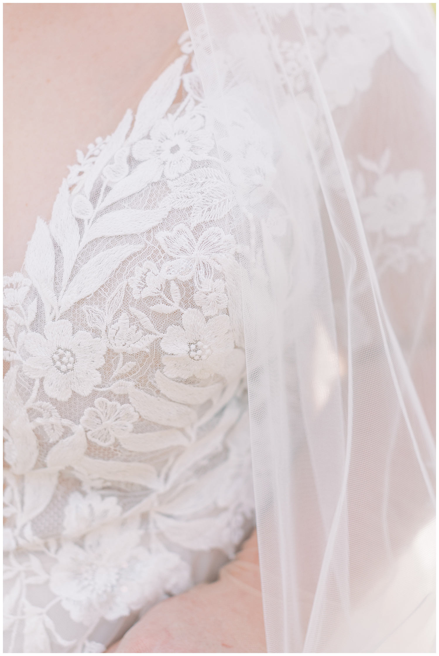 Lace detail covers the bridal gown.