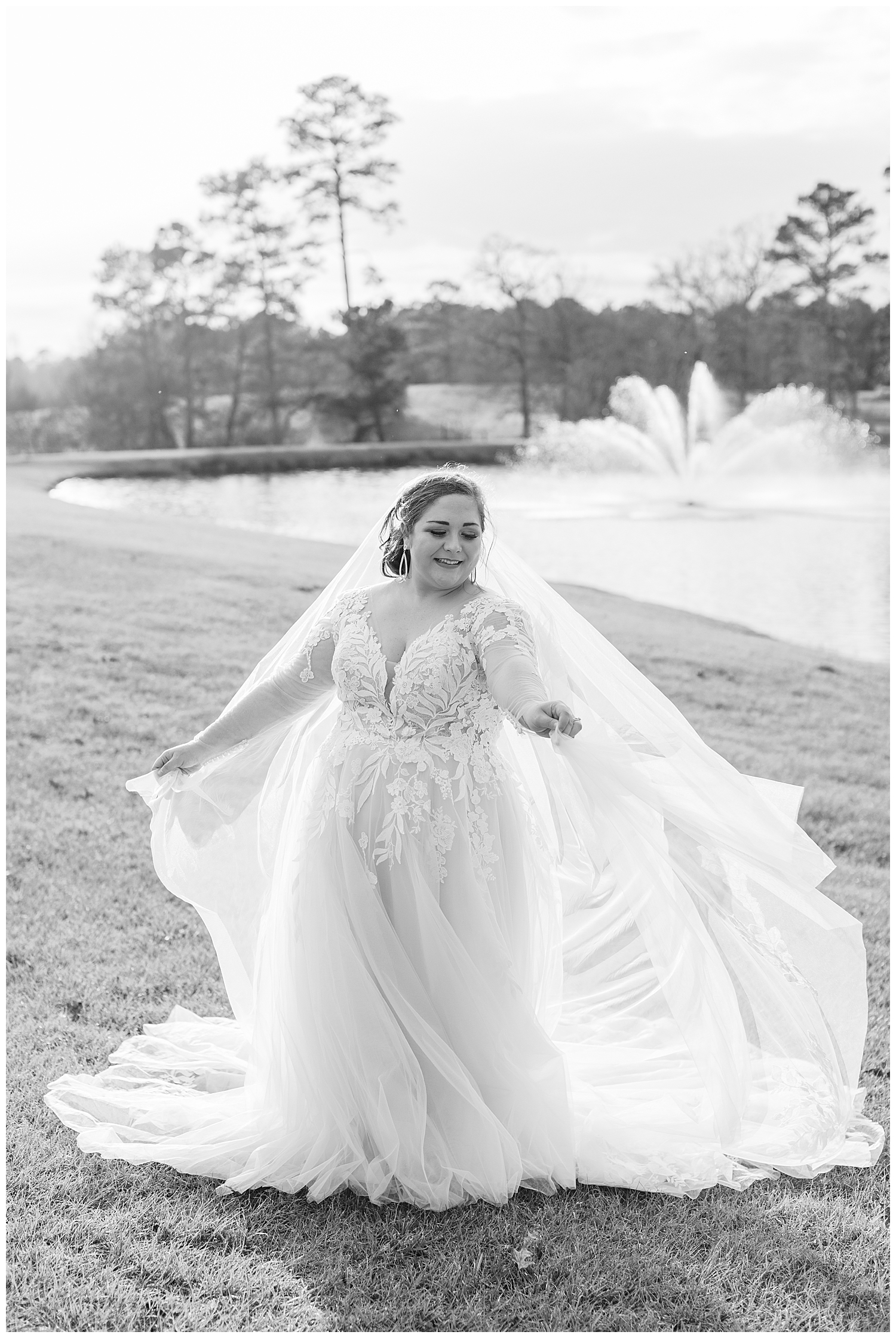 A bride twirls the veil and her dress at Green Gates Farmhouse.