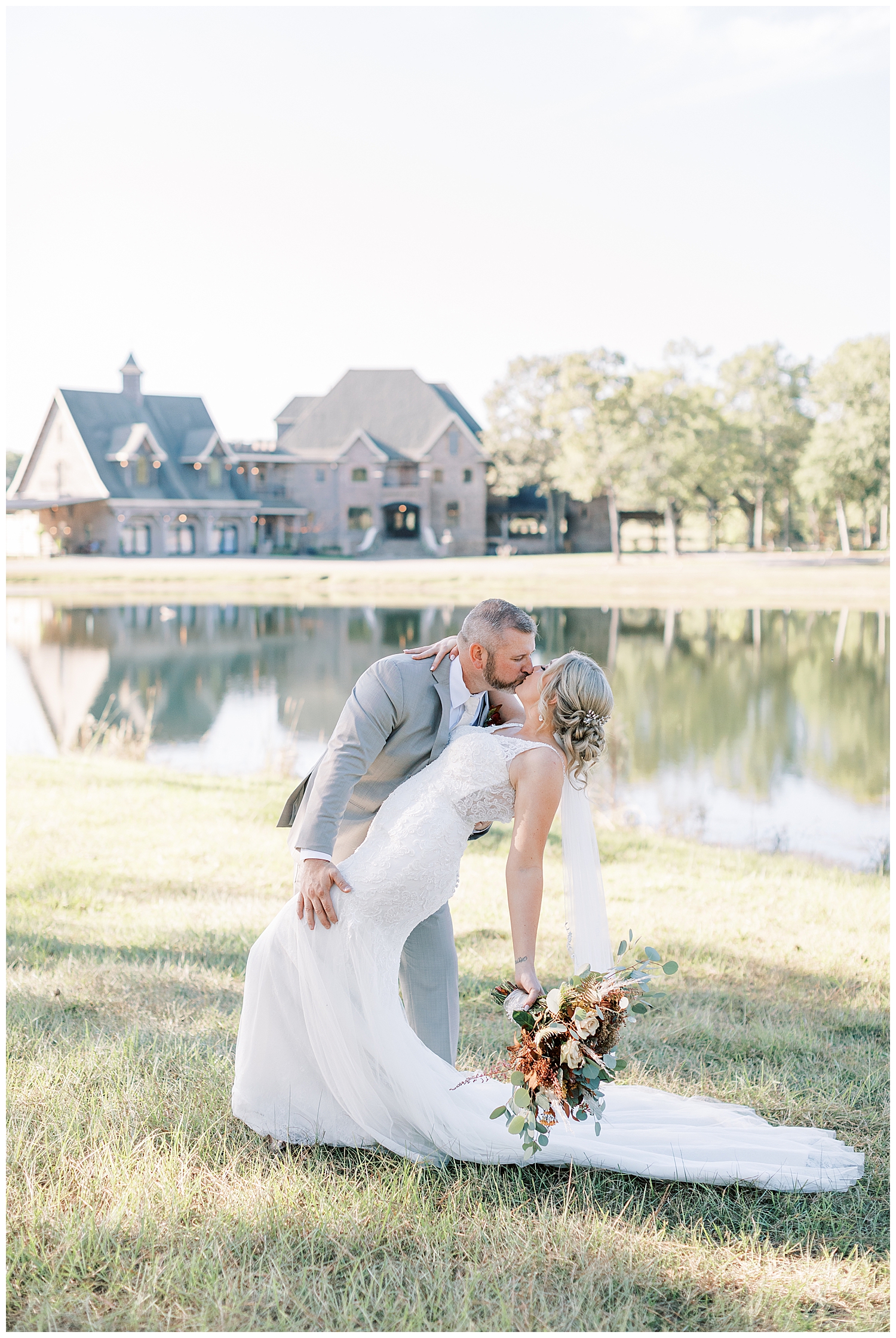 A bride and groom kiss while standing before Three Lakes Manor in Poplarville.