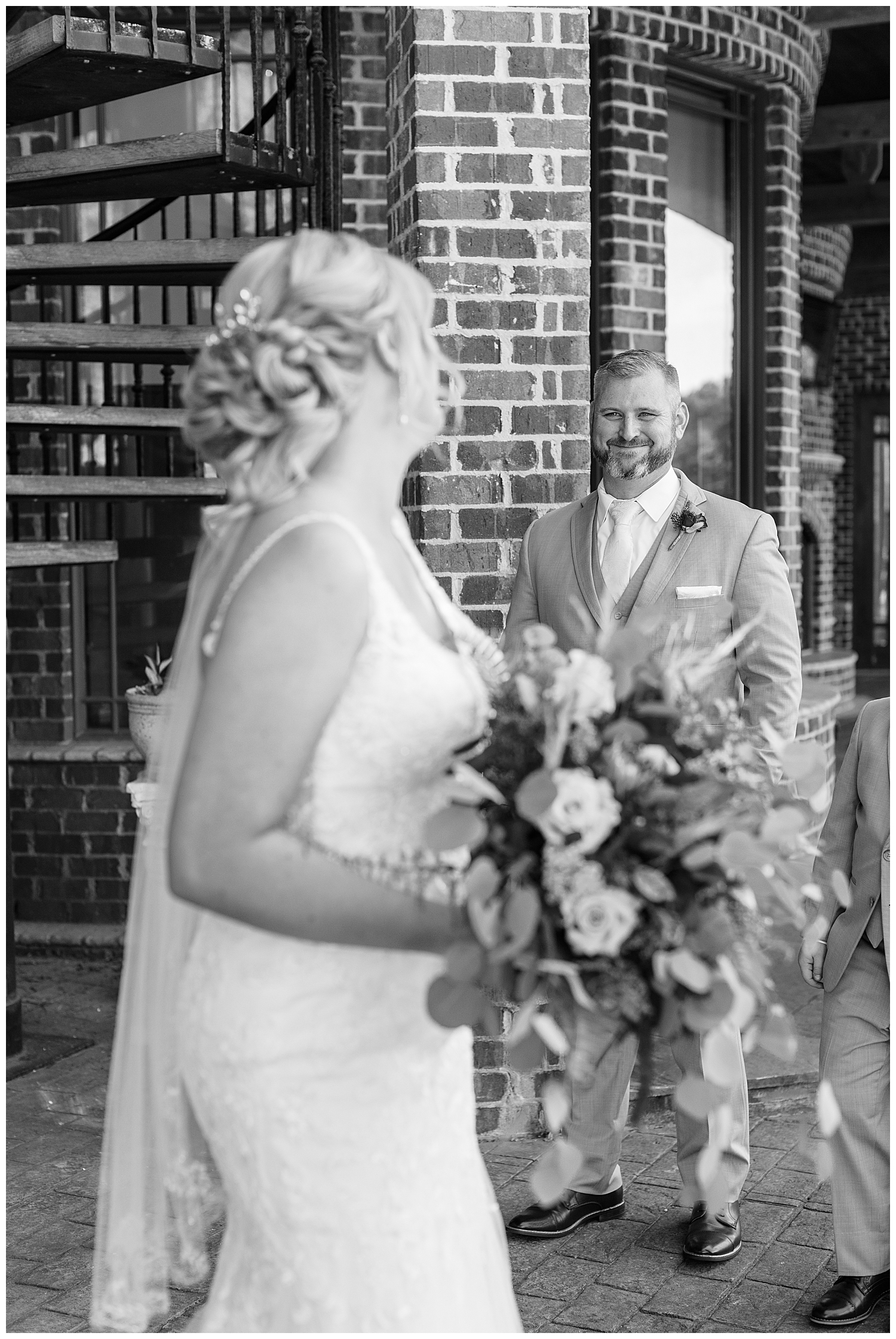 A groom admires his beautiful bride.