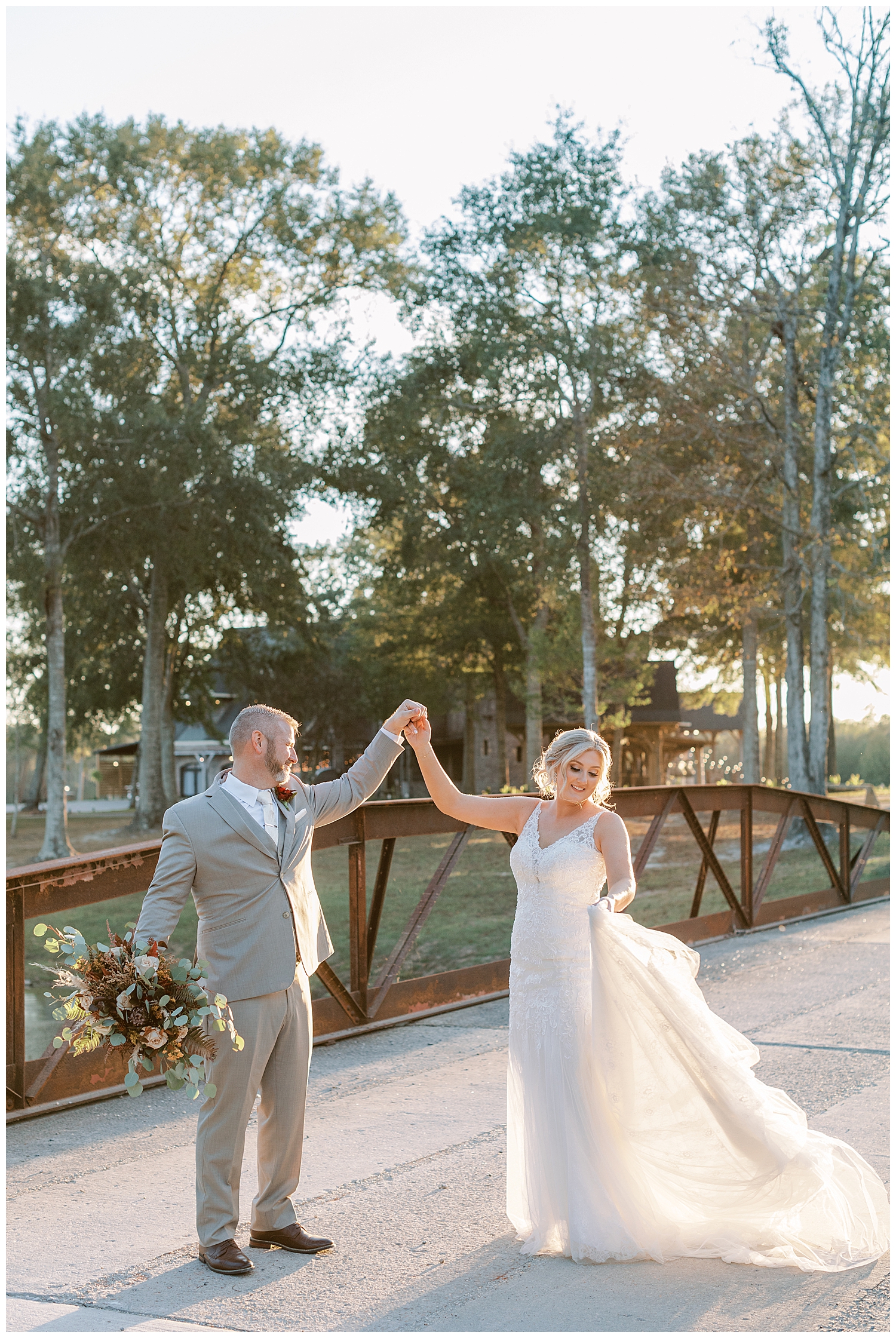 A wife twirls her wedding gown.