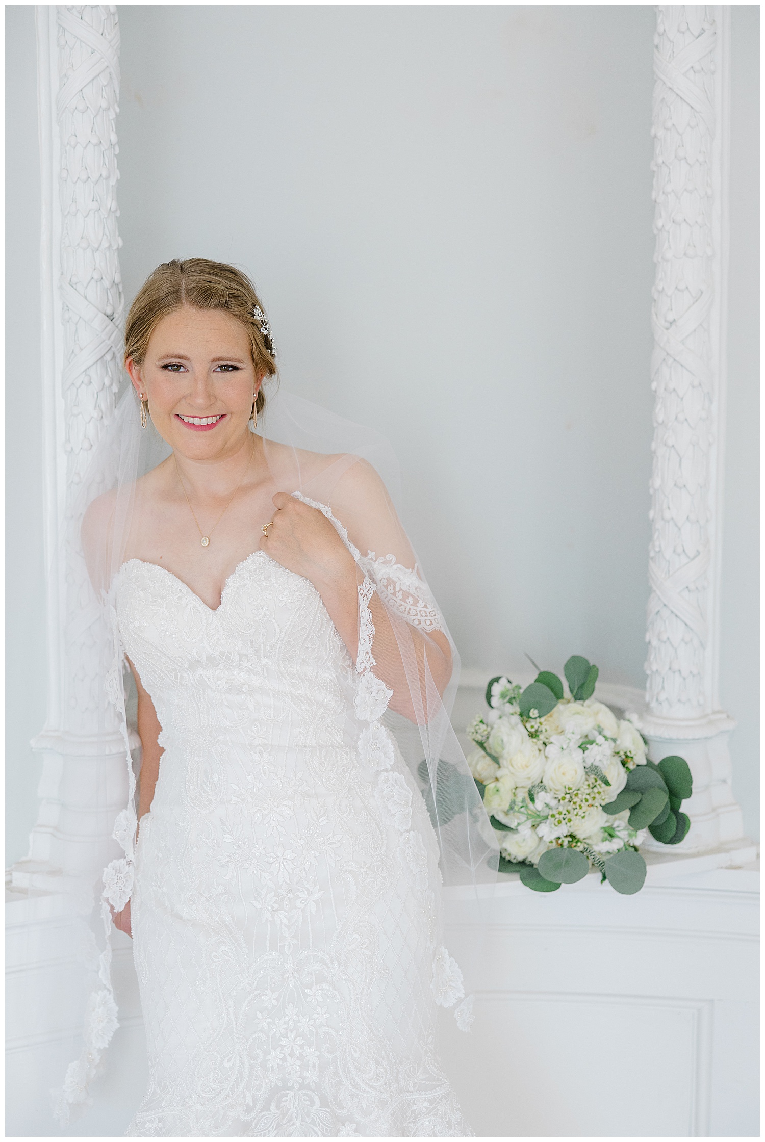 A bride smiles at Butterfield Mansion.